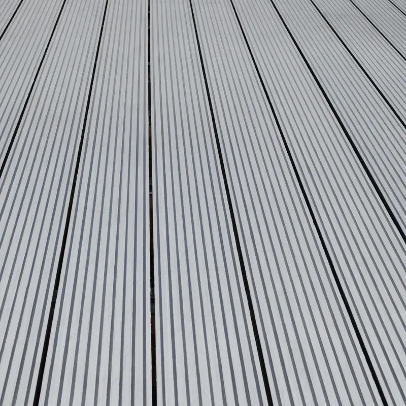 Close up of grey composite deck boards with concealed fixings