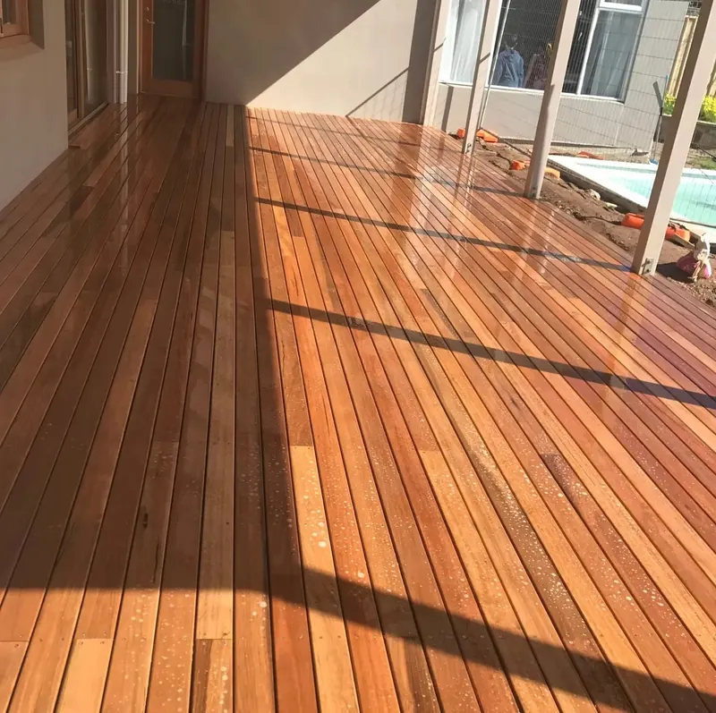 Close up of freshly oiled hardwood deck boards