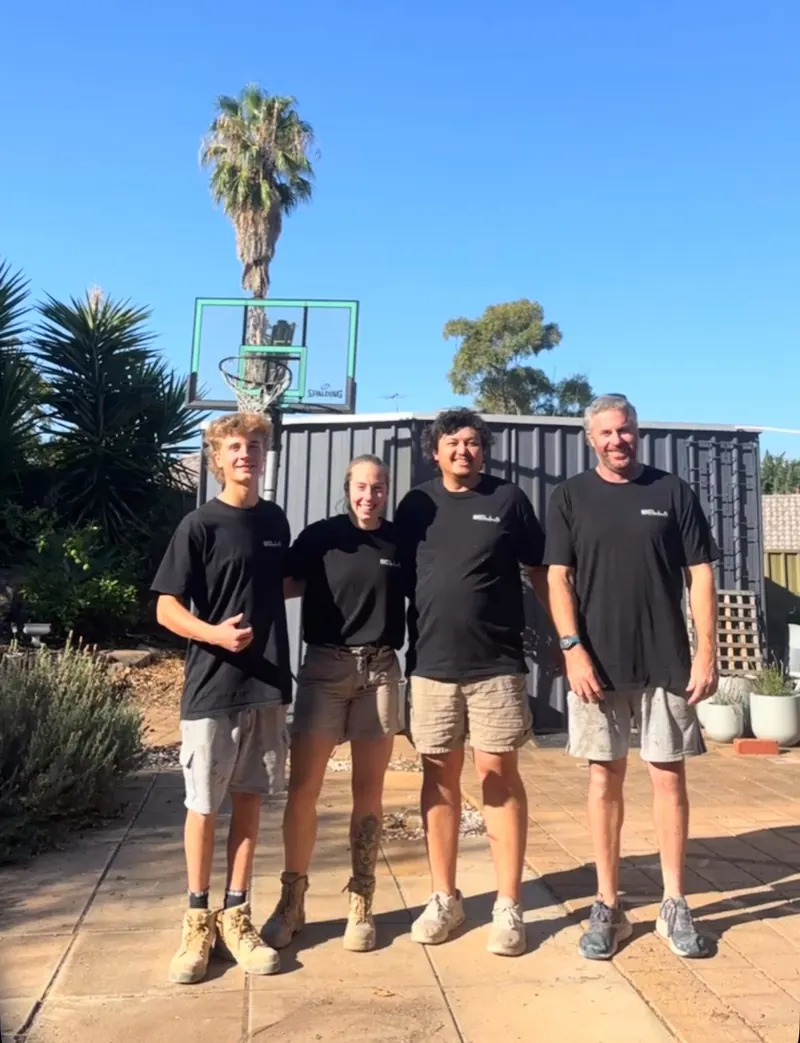 The Adelaide Decks team of four carpenters in their work shirts