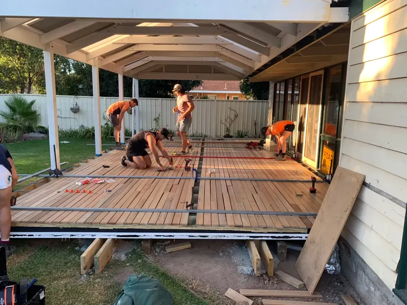 Adelaide Decks carpenters laying timber deck boards on a new subframe